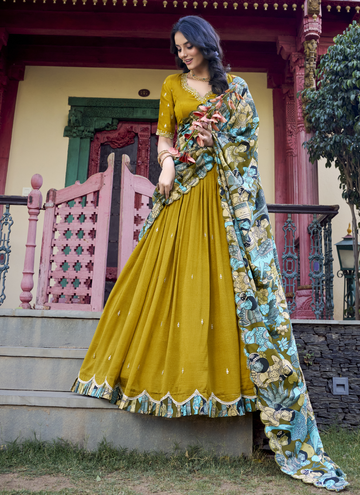 Amazing Musturd Yellow SIlk lehenga choli with sequin embroidery and kalamkari print border